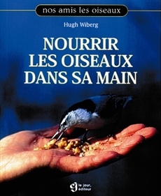 Nourrir les oiseaux dans sa main par Hugh Wiberg