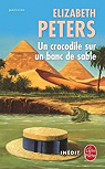 Un crocodile sur un banc de sable par Peters