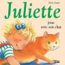 Juliette joue avec son chat par Lauer